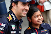 GP CITTA DEL MESSICO, (L to R): Sergio Perez (MEX) Red Bull Racing with a young fan.
27.10.2022. Formula 1 World Championship, Rd 20, Mexican Grand Prix, Mexico City, Mexico, Preparation Day.
 - www.xpbimages.com, EMail: requests@xpbimages.com © Copyright: Coates / XPB Images
