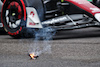 GP EMILIA ROMAGNA, An Alfa Romeo F1 Team C42 passes some smoking debris from the Williams Racing FW44 of Alexander Albon (THA).
22.04.2022. Formula 1 World Championship, Rd 4, Emilia Romagna Grand Prix, Imola, Italy, Qualifiche Day.
 - www.xpbimages.com, EMail: requests@xpbimages.com © Copyright: Coates / XPB Images