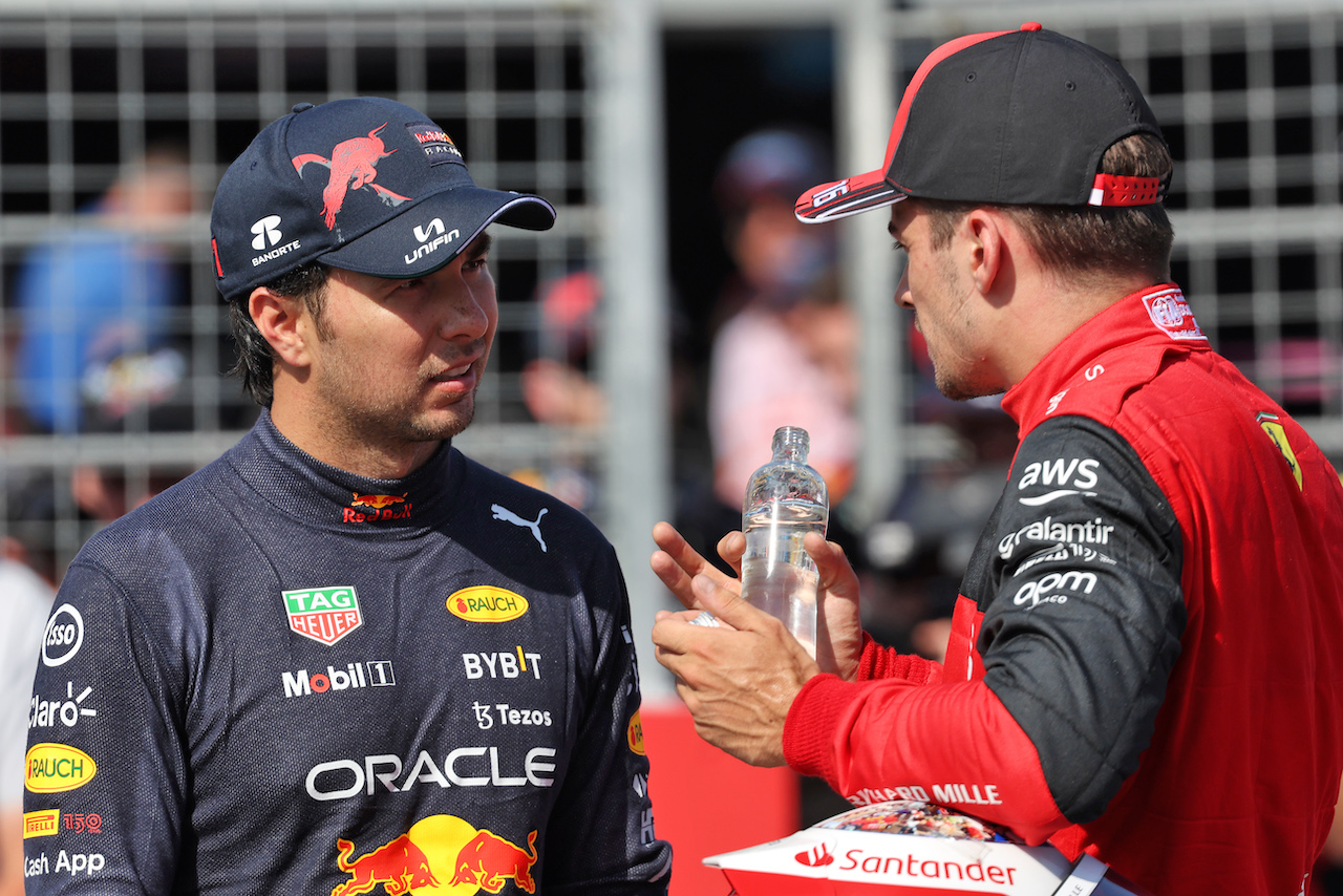 GP FRANCIA, (L to R): Sergio Perez (MEX) Red Bull Racing with pole sitter Charles Leclerc (MON) Ferrari in qualifying parc ferme.
23.07.2022. Formula 1 World Championship, Rd 12, French Grand Prix, Paul Ricard, France, Qualifiche Day.
- www.xpbimages.com, EMail: requests@xpbimages.com © Copyright: Bearne / XPB Images