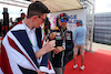 GP GRAN BRETAGNA, Sergio Perez (MEX) Red Bull Racing with a fan.
01.07.2022. Formula 1 World Championship, Rd 10, British Grand Prix, Silverstone, England, Practice Day.
 - www.xpbimages.com, EMail: requests@xpbimages.com © Copyright: Coates / XPB Images