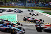GP ITALIA, Guanyu Zhou (CHN) Alfa Romeo F1 Team C42 runs wide with Mick Schumacher (GER) Haas VF-22 at the partenza of the race.
11.09.2022. Formula 1 World Championship, Rd 16, Italian Grand Prix, Monza, Italy, Gara Day.
- www.xpbimages.com, EMail: requests@xpbimages.com © Copyright: Batchelor / XPB Images