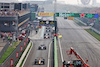 GP OLANDA, Max Verstappen (NLD) Red Bull Racing RB18 as they pass the Alfa Romeo F1 Team C42 of race retiree Valtteri Bottas (FIN).
04.09.2022. Formula 1 World Championship, Rd 14, Dutch Grand Prix, Zandvoort, Netherlands, Gara Day.
- www.xpbimages.com, EMail: requests@xpbimages.com © Copyright: Bearne / XPB Images