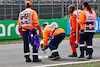 GP OLANDA, Marshals cover the oil left on the circuit when Max Verstappen (NLD) Red Bull Racing RB18 stopped on track in the first practice session.
02.09.2022. Formula 1 World Championship, Rd 14, Dutch Grand Prix, Zandvoort, Netherlands, Practice Day.
- www.xpbimages.com, EMail: requests@xpbimages.com © Copyright: Miltenburg / XPB Images