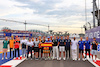 GP SINGAPORE, Fernando Alonso (ESP) Alpine F1 Team celebrates his 350th Grand Prix with his fellow drivers.
02.10.2022. Formula 1 World Championship, Rd 17, Singapore Grand Prix, Marina Bay Street Circuit, Singapore, Gara Day.
- www.xpbimages.com, EMail: requests@xpbimages.com © Copyright: Batchelor / XPB Images