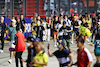 GP SINGAPORE, Circuit Atmosfera - fans run to the podium.
02.10.2022. Formula 1 World Championship, Rd 17, Singapore Grand Prix, Marina Bay Street Circuit, Singapore, Gara Day.
- www.xpbimages.com, EMail: requests@xpbimages.com © Copyright: Moy / XPB Images