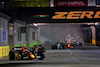 GP SINGAPORE, Sergio Perez (MEX) Red Bull Racing RB18 davanti a at the partenza of the race.
02.10.2022. Formula 1 World Championship, Rd 17, Singapore Grand Prix, Marina Bay Street Circuit, Singapore, Gara Day.
 - www.xpbimages.com, EMail: requests@xpbimages.com © Copyright: Coates / XPB Images