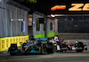 GP SINGAPORE, (L to R): George Russell (GBR) Mercedes AMG F1 W13 e Valtteri Bottas (FIN) Alfa Romeo F1 Team C42 battle for position.
02.10.2022. Formula 1 World Championship, Rd 17, Singapore Grand Prix, Marina Bay Street Circuit, Singapore, Gara Day.
 - www.xpbimages.com, EMail: requests@xpbimages.com © Copyright: Coates / XPB Images