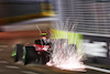 GP SINGAPORE, Carlos Sainz Jr (ESP) Ferrari F1-75 sends sparks flying.
01.10.2022. Formula 1 World Championship, Rd 17, Singapore Grand Prix, Marina Bay Street Circuit, Singapore, Qualifiche Day.
 - www.xpbimages.com, EMail: requests@xpbimages.com © Copyright: Coates / XPB Images