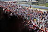 GP SPAGNA, Circuit Atmosfera - fans invade the circuit to head to the podium at the end of the race.
22.05.2022. Formula 1 World Championship, Rd 6, Spanish Grand Prix, Barcelona, Spain, Gara Day.
 - www.xpbimages.com, EMail: requests@xpbimages.com © Copyright: Coates / XPB Images