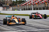 TEST BARCELLONA, Daniel Ricciardo (AUS) McLaren MCL36 e Carlos Sainz Jr (ESP) Ferrari F1-75.
25.02.2022. Formula One Testing, Day Three, Barcelona, Spain. Venerdi'.
- www.xpbimages.com, EMail: requests@xpbimages.com © Copyright: Batchelor / XPB Images