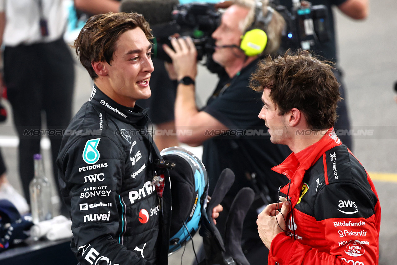 GP ABU DHABI, (L to R): George Russell (GBR) Mercedes AMG F1 with Charles Leclerc (MON) Ferrari in parc ferme.

26.11.2023. Formula 1 World Championship, Rd 23, Abu Dhabi Grand Prix, Yas Marina Circuit, Abu Dhabi, Gara Day.

- www.xpbimages.com, EMail: requests@xpbimages.com © Copyright: Batchelor / XPB Images