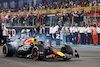 GP ABU DHABI, Gara winner Max Verstappen (NLD) Red Bull Racing RB19 celebrates with doughnuts at the end of the race in parc ferme.
26.11.2023. Formula 1 World Championship, Rd 23, Abu Dhabi Grand Prix, Yas Marina Circuit, Abu Dhabi, Gara Day.
 - www.xpbimages.com, EMail: requests@xpbimages.com © Copyright: Coates / XPB Images