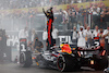 GP ABU DHABI, Gara winner Max Verstappen (NLD) Red Bull Racing RB19 celebrates in parc ferme.
26.11.2023. Formula 1 World Championship, Rd 23, Abu Dhabi Grand Prix, Yas Marina Circuit, Abu Dhabi, Gara Day.
 - www.xpbimages.com, EMail: requests@xpbimages.com © Copyright: Coates / XPB Images