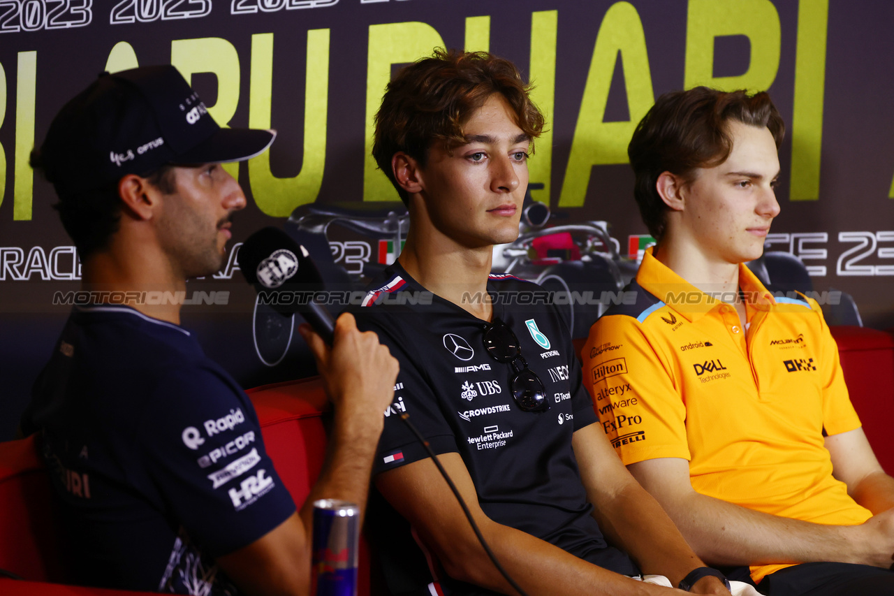 GP ABU DHABI, (L to R): Daniel Ricciardo (AUS) AlphaTauri; George Russell (GBR) Mercedes AMG F1; e Oscar Piastri (AUS) McLaren, in the FIA Press Conference.

23.11.2023. Formula 1 World Championship, Rd 23, Abu Dhabi Grand Prix, Yas Marina Circuit, Abu Dhabi, Preparation Day.

- www.xpbimages.com, EMail: requests@xpbimages.com © Copyright: Batchelor / XPB Images