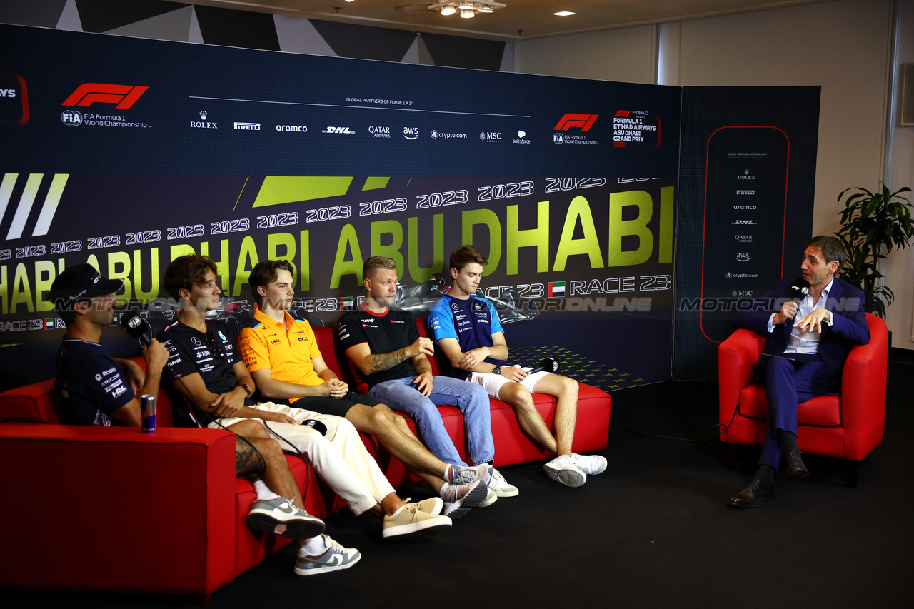 GP ABU DHABI, (L to R): Daniel Ricciardo (AUS) AlphaTauri; George Russell (GBR) Mercedes AMG F1; Oscar Piastri (AUS) McLaren; Kevin Magnussen (DEN) Haas F1 Team; e Logan Sargeant (USA) Williams Racing, in the FIA Press Conference.

23.11.2023. Formula 1 World Championship, Rd 23, Abu Dhabi Grand Prix, Yas Marina Circuit, Abu Dhabi, Preparation Day.

- www.xpbimages.com, EMail: requests@xpbimages.com © Copyright: Batchelor / XPB Images