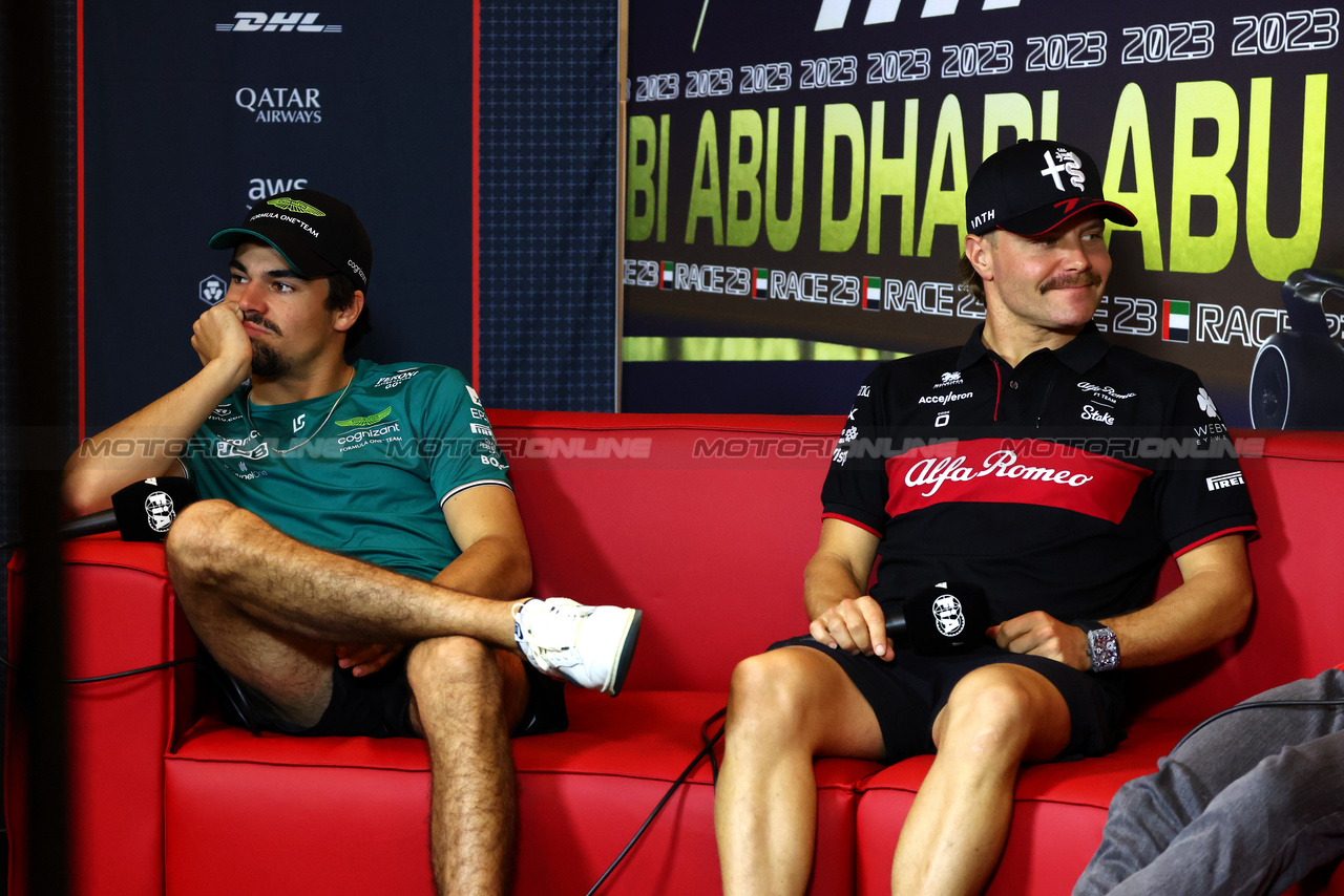 GP ABU DHABI, (L to R): Lance Stroll (CDN) Aston Martin F1 Team an Valtteri Bottas (FIN) Alfa Romeo F1 Team in the FIA Press Conference.

23.11.2023. Formula 1 World Championship, Rd 23, Abu Dhabi Grand Prix, Yas Marina Circuit, Abu Dhabi, Preparation Day.

- www.xpbimages.com, EMail: requests@xpbimages.com © Copyright: Batchelor / XPB Images
