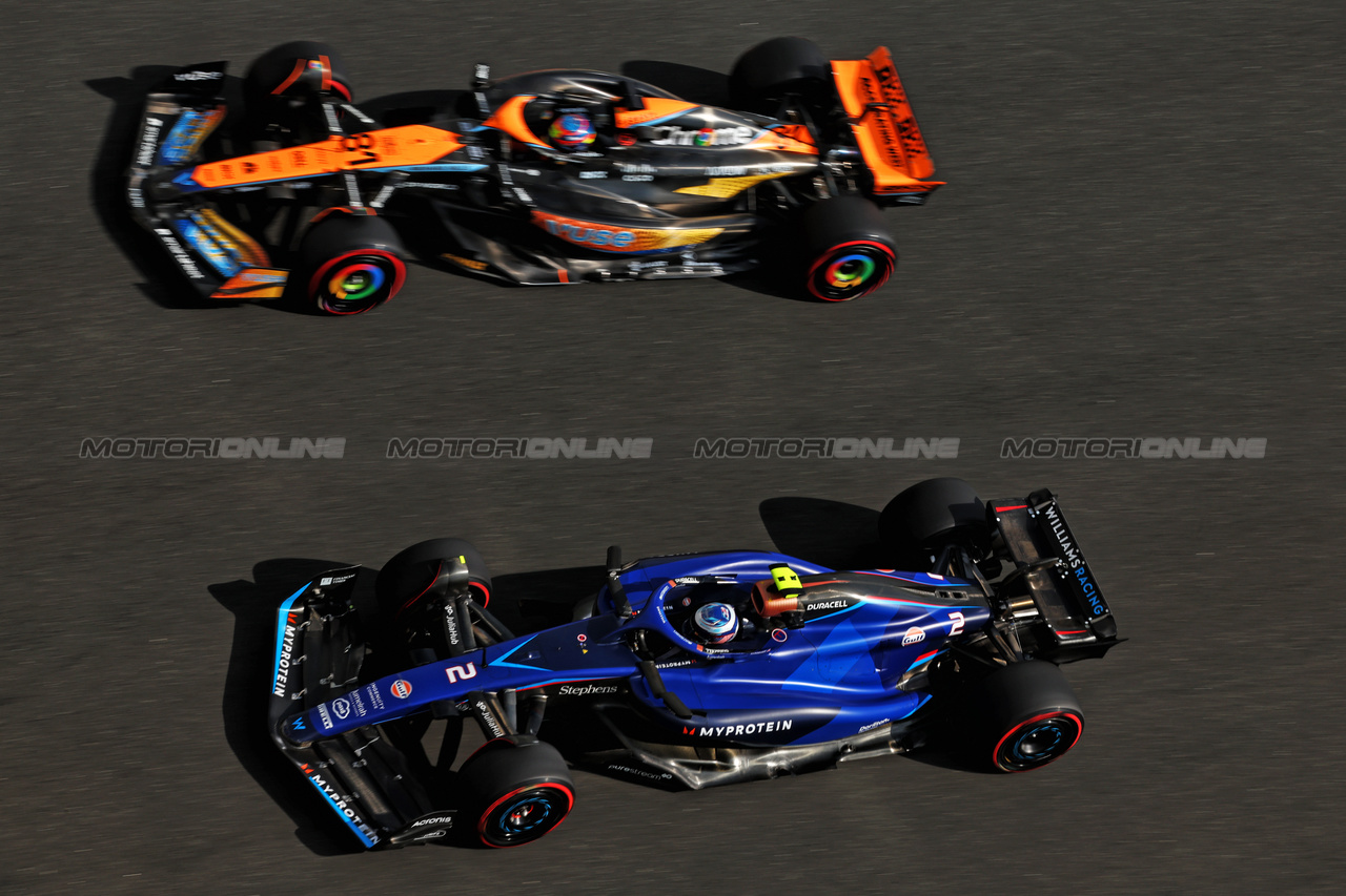 GP ABU DHABI, Logan Sargeant (USA) Williams Racing FW45 e Oscar Piastri (AUS) McLaren MCL60.

24.11.2023. Formula 1 World Championship, Rd 23, Abu Dhabi Grand Prix, Yas Marina Circuit, Abu Dhabi, Practice Day.

- www.xpbimages.com, EMail: requests@xpbimages.com © Copyright: Moy / XPB Images