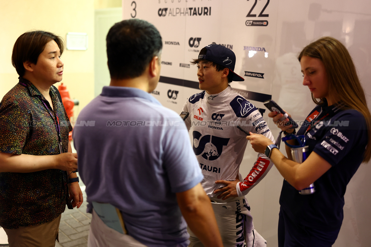 GP ABU DHABI, Yuki Tsunoda (JPN) AlphaTauri with the media.

24.11.2023. Formula 1 World Championship, Rd 23, Abu Dhabi Grand Prix, Yas Marina Circuit, Abu Dhabi, Practice Day.

 - www.xpbimages.com, EMail: requests@xpbimages.com © Copyright: Coates / XPB Images