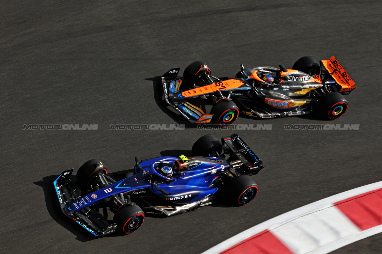 GP ABU DHABI, Logan Sargeant (USA) Williams Racing FW45 e Oscar Piastri (AUS) McLaren MCL60.

24.11.2023. Formula 1 World Championship, Rd 23, Abu Dhabi Grand Prix, Yas Marina Circuit, Abu Dhabi, Practice Day.

- www.xpbimages.com, EMail: requests@xpbimages.com © Copyright: Moy / XPB Images