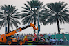 GP ABU DHABI, The Ferrari SF-23 Carlos Sainz Jr (ESP) is recovered back to the pits on the back of a truck after he crashed in the second practice session.
24.11.2023. Formula 1 World Championship, Rd 23, Abu Dhabi Grand Prix, Yas Marina Circuit, Abu Dhabi, Practice Day.
 - www.xpbimages.com, EMail: requests@xpbimages.com © Copyright: Coates / XPB Images