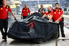 GP ABU DHABI, Ferrari meccanici with the damaged Ferrari SF-23 of Carlos Sainz Jr (ESP) Ferrari in the pits in the second practice session.
24.11.2023. Formula 1 World Championship, Rd 23, Abu Dhabi Grand Prix, Yas Marina Circuit, Abu Dhabi, Practice Day.
- www.xpbimages.com, EMail: requests@xpbimages.com © Copyright: Batchelor / XPB Images