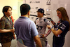 GP ABU DHABI, Yuki Tsunoda (JPN) AlphaTauri with the media.
24.11.2023. Formula 1 World Championship, Rd 23, Abu Dhabi Grand Prix, Yas Marina Circuit, Abu Dhabi, Practice Day.
 - www.xpbimages.com, EMail: requests@xpbimages.com © Copyright: Coates / XPB Images