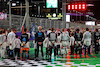 GP ARABIA SAUDITA, Drivers as the grid observes the national anthem.
19.03.2023. Formula 1 World Championship, Rd 2, Saudi Arabian Grand Prix, Jeddah, Saudi Arabia, Gara Day.
 - www.xpbimages.com, EMail: requests@xpbimages.com © Copyright: Coates / XPB Images