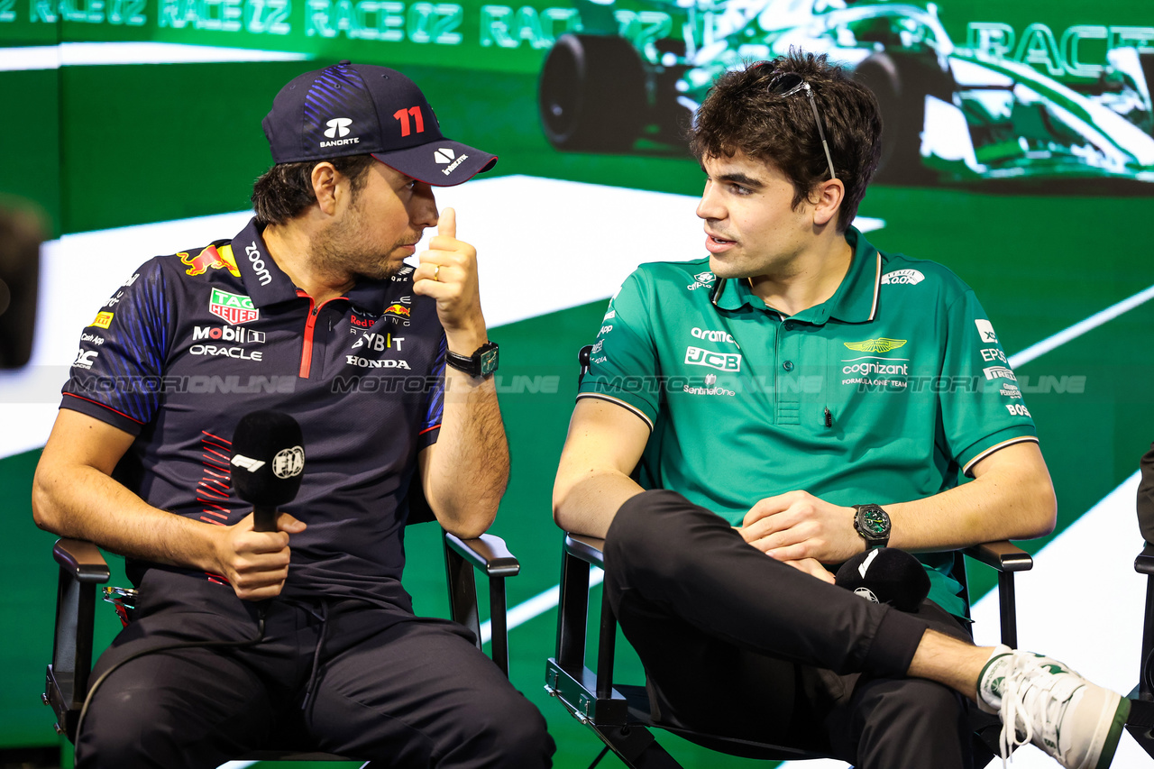 GP ARABIA SAUDITA, (L to R): Sergio Perez (MEX) Red Bull Racing with Lance Stroll (CDN) Aston Martin F1 Team in the FIA Press Conference.

16.03.2023. Formula 1 World Championship, Rd 2, Saudi Arabian Grand Prix, Jeddah, Saudi Arabia, Preparation Day.

- www.xpbimages.com, EMail: requests@xpbimages.com ¬© Copyright: XPB Images