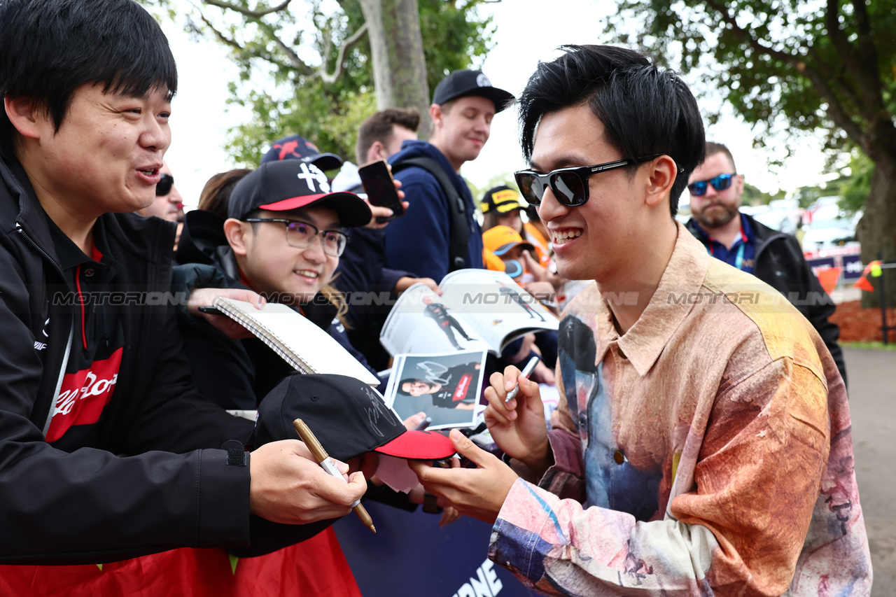 GP AUSTRALIA, Zhou Guanyu (CHN) Alfa Romeo F1 Team with fans.

30.03.2023. Formula 1 World Championship, Rd 3, Australian Grand Prix, Albert Park, Melbourne, Australia, Preparation Day.

- www.xpbimages.com, EMail: requests@xpbimages.com ¬© Copyright: Batchelor / XPB Images