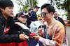 GP AUSTRALIA, Zhou Guanyu (CHN) Alfa Romeo F1 Team with fans.
30.03.2023. Formula 1 World Championship, Rd 3, Australian Grand Prix, Albert Park, Melbourne, Australia, Preparation Day.
- www.xpbimages.com, EMail: requests@xpbimages.com ¬© Copyright: Batchelor / XPB Images