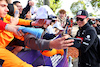 GP AUSTRALIA, Zhou Guanyu (CHN) Alfa Romeo F1 Team with fans.
01.04.2023. Formula 1 World Championship, Rd 3, Australian Grand Prix, Albert Park, Melbourne, Australia, Qualifiche Day.
- www.xpbimages.com, EMail: requests@xpbimages.com ¬© Copyright: Batchelor / XPB Images