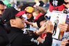 GP AUSTRALIA, Zhou Guanyu (CHN) Alfa Romeo F1 Team with fans.
01.04.2023. Formula 1 World Championship, Rd 3, Australian Grand Prix, Albert Park, Melbourne, Australia, Qualifiche Day.
- www.xpbimages.com, EMail: requests@xpbimages.com ¬© Copyright: Batchelor / XPB Images