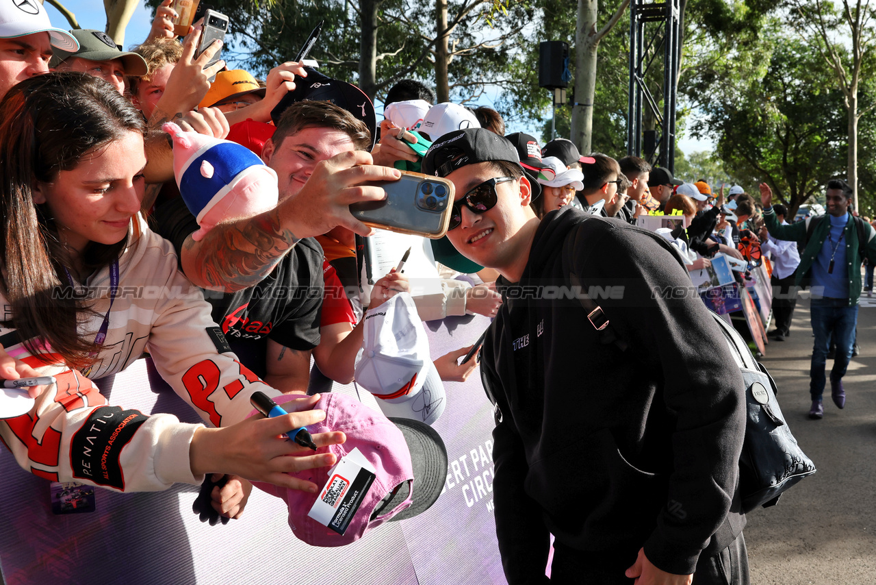 GP AUSTRALIA, Zhou Guanyu (CHN) Alfa Romeo F1 Team with fans.

31.03.2023. Formula 1 World Championship, Rd 3, Australian Grand Prix, Albert Park, Melbourne, Australia, Practice Day.

- www.xpbimages.com, EMail: requests@xpbimages.com ¬© Copyright: Moy / XPB Images