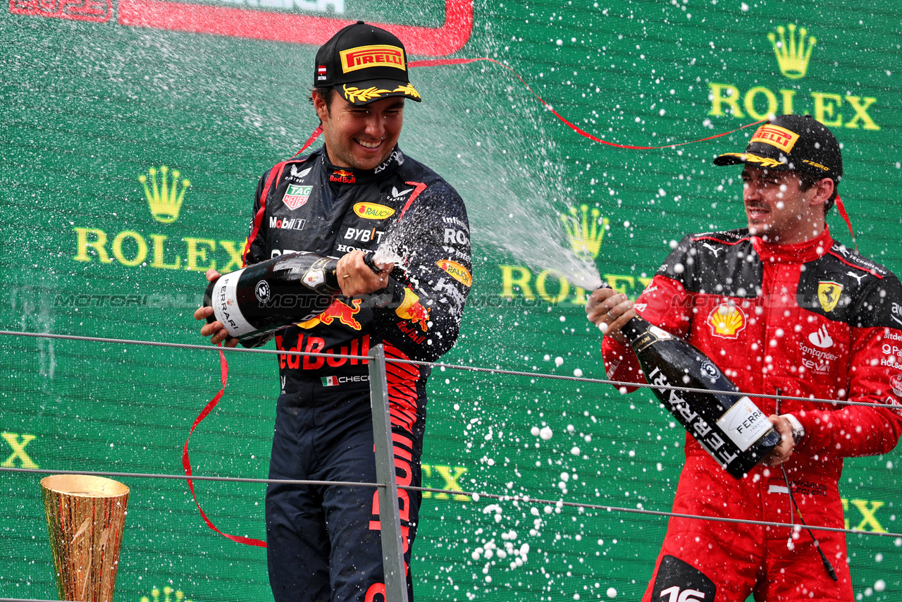 GP AUSTRIA, Sergio Perez (MEX) Red Bull Racing celebrates his third position on the podium.

02.07.2023. Formula 1 World Championship, Rd 10, Austrian Grand Prix, Spielberg, Austria, Gara Day.

- www.xpbimages.com, EMail: requests@xpbimages.com © Copyright: Moy / XPB Images