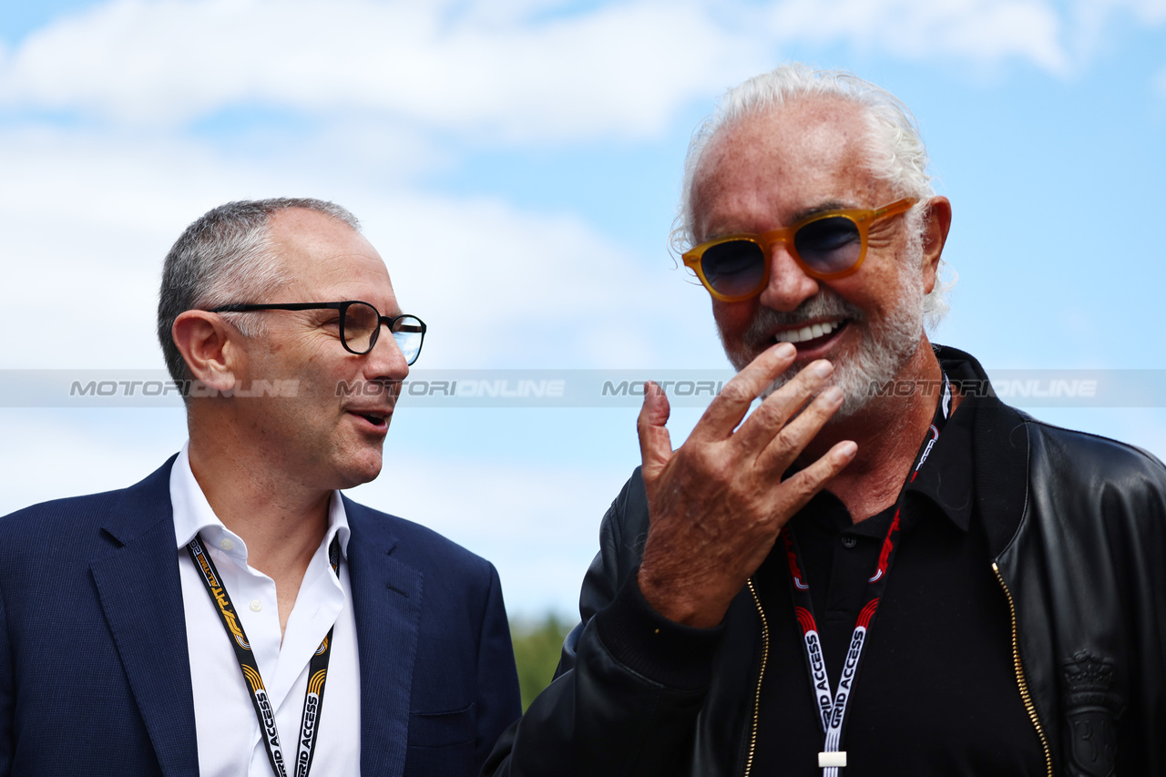 GP AUSTRIA, (L to R): Stefano Domenicali (ITA) Formula One President e CEO with Flavio Briatore (ITA) og.

02.07.2023. Formula 1 World Championship, Rd 10, Austrian Grand Prix, Spielberg, Austria, Gara Day.

- www.xpbimages.com, EMail: requests@xpbimages.com © Copyright: Batchelor / XPB Images