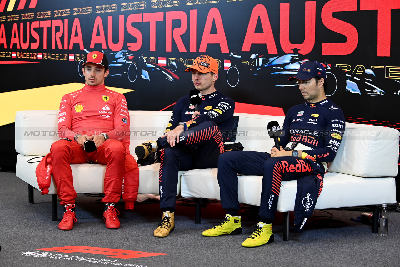 GP AUSTRIA, (L to R): Charles Leclerc (MON) Ferrari; Max Verstappen (NLD) Red Bull Racing; e Sergio Perez (MEX) Red Bull Racing, in the post race FIA Press Conference.

02.07.2023. Formula 1 World Championship, Rd 10, Austrian Grand Prix, Spielberg, Austria, Gara Day.

- www.xpbimages.com, EMail: requests@xpbimages.com © Copyright: XPB Images