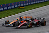 GP AUSTRIA, Valtteri Bottas (FIN) Alfa Romeo F1 Team C43 e Oscar Piastri (AUS) McLaren MCL60 battle for position.
02.07.2023. Formula 1 World Championship, Rd 10, Austrian Grand Prix, Spielberg, Austria, Gara Day.
 - www.xpbimages.com, EMail: requests@xpbimages.com © Copyright: Coates / XPB Images