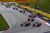 GP AUSTRIA, (L to R): Max Verstappen (NLD) Red Bull Racing RB19 e Charles Leclerc (MON) Ferrari SF-23 lead at the partenza of the race.
02.07.2023. Formula 1 World Championship, Rd 10, Austrian Grand Prix, Spielberg, Austria, Gara Day.
 - www.xpbimages.com, EMail: requests@xpbimages.com © Copyright: Coates / XPB Images