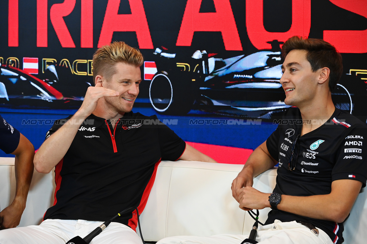 GP AUSTRIA, (L to R): Nico Hulkenberg (GER) Haas F1 Team e George Russell (GBR) Mercedes AMG F1 in the FIA Press Conference.

29.06.2023. Formula 1 World Championship, Rd 10, Austrian Grand Prix, Spielberg, Austria, Preparation Day.

- www.xpbimages.com, EMail: requests@xpbimages.com © Copyright: XPB Images