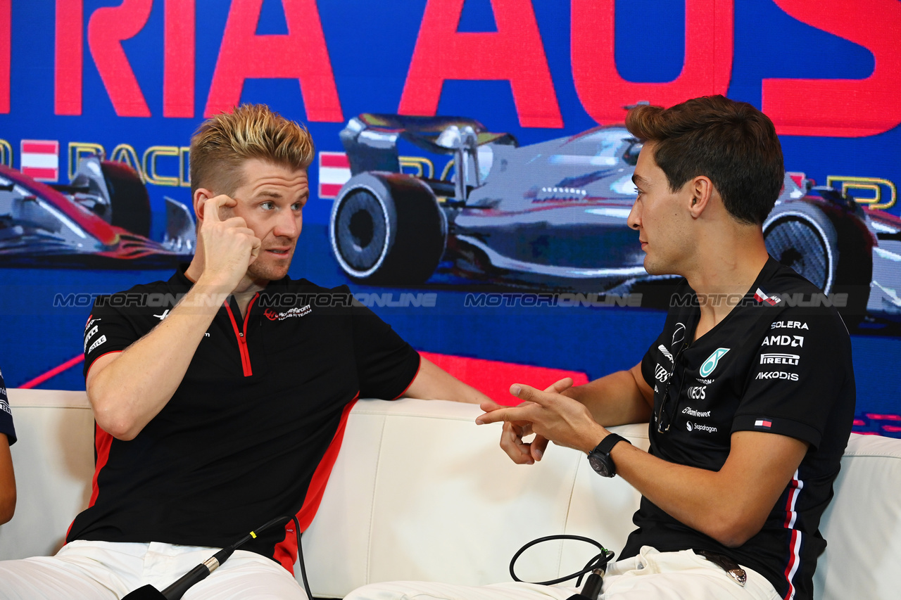 GP AUSTRIA, (L to R): Nico Hulkenberg (GER) Haas F1 Team e George Russell (GBR) Mercedes AMG F1 in the FIA Press Conference.

29.06.2023. Formula 1 World Championship, Rd 10, Austrian Grand Prix, Spielberg, Austria, Preparation Day.

- www.xpbimages.com, EMail: requests@xpbimages.com © Copyright: XPB Images