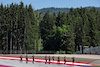 GP AUSTRIA, Zhou Guanyu (CHN) Alfa Romeo F1 Team walks the circuit with the team.
29.06.2023. Formula 1 World Championship, Rd 10, Austrian Grand Prix, Spielberg, Austria, Preparation Day.
- www.xpbimages.com, EMail: requests@xpbimages.com © Copyright: Moy / XPB Images