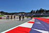 GP AUSTRIA, Zhou Guanyu (CHN) Alfa Romeo F1 Team walks the circuit with the team.
29.06.2023. Formula 1 World Championship, Rd 10, Austrian Grand Prix, Spielberg, Austria, Preparation Day.
- www.xpbimages.com, EMail: requests@xpbimages.com © Copyright: Moy / XPB Images