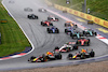 GP AUSTRIA, (L to R): Max Verstappen (NLD) Red Bull Racing RB19 e team mate Sergio Perez (MEX) Red Bull Racing RB19 battle for the lead at the partenza of the race.
01.07.2023. Formula 1 World Championship, Rd 10, Austrian Grand Prix, Spielberg, Austria, Sprint Day.
- www.xpbimages.com, EMail: requests@xpbimages.com © Copyright: Batchelor / XPB Images