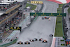 GP AUSTRIA, (L to R): Sergio Perez (MEX) Red Bull Racing RB19 e Max Verstappen (NLD) Red Bull Racing RB19 battle for the lead at the partenza of the race.
01.07.2023. Formula 1 World Championship, Rd 10, Austrian Grand Prix, Spielberg, Austria, Sprint Day.
- www.xpbimages.com, EMail: requests@xpbimages.com © Copyright: Moy / XPB Images