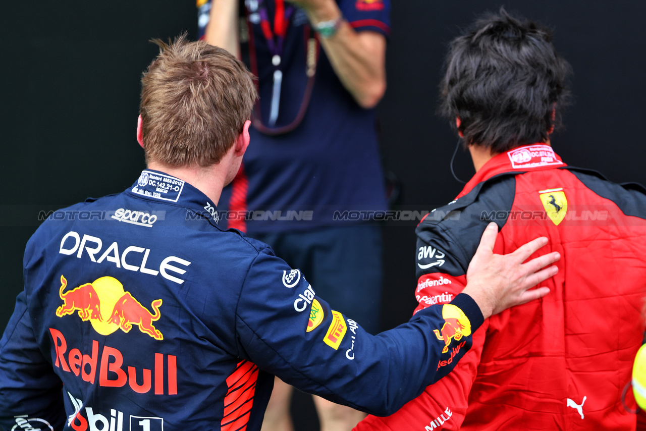 GP AUSTRIA, (L to R): Max Verstappen (NLD) Red Bull Racing with Carlos Sainz Jr (ESP) Ferrari in qualifying parc ferme.

30.06.2023. Formula 1 World Championship, Rd 10, Austrian Grand Prix, Spielberg, Austria, Qualifiche Day.

- www.xpbimages.com, EMail: requests@xpbimages.com © Copyright: Batchelor / XPB Images