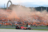 GP AUSTRIA, Carlos Sainz Jr (ESP) Ferrari SF-23 passes fans in the grandstand with flares being set off.
30.06.2023. Formula 1 World Championship, Rd 10, Austrian Grand Prix, Spielberg, Austria, Qualifiche Day.
- www.xpbimages.com, EMail: requests@xpbimages.com © Copyright: Moy / XPB Images