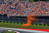 GP AUSTRIA, An orange flare lands near the track.
30.06.2023. Formula 1 World Championship, Rd 10, Austrian Grand Prix, Spielberg, Austria, Qualifiche Day.
- www.xpbimages.com, EMail: requests@xpbimages.com © Copyright: Moy / XPB Images
