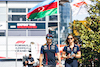 GP AZERBAIJAN, (L to R): Sergio Perez (MEX) Red Bull Racing with Alice Hedworth (GBR) Red Bull Racing Communications Manager.
27.04.2023. Formula 1 World Championship, Rd 4, Azerbaijan Grand Prix, Baku Street Circuit, Azerbaijan, Preparation Day.
- www.xpbimages.com, EMail: requests@xpbimages.com ¬© Copyright: Bearne / XPB Images