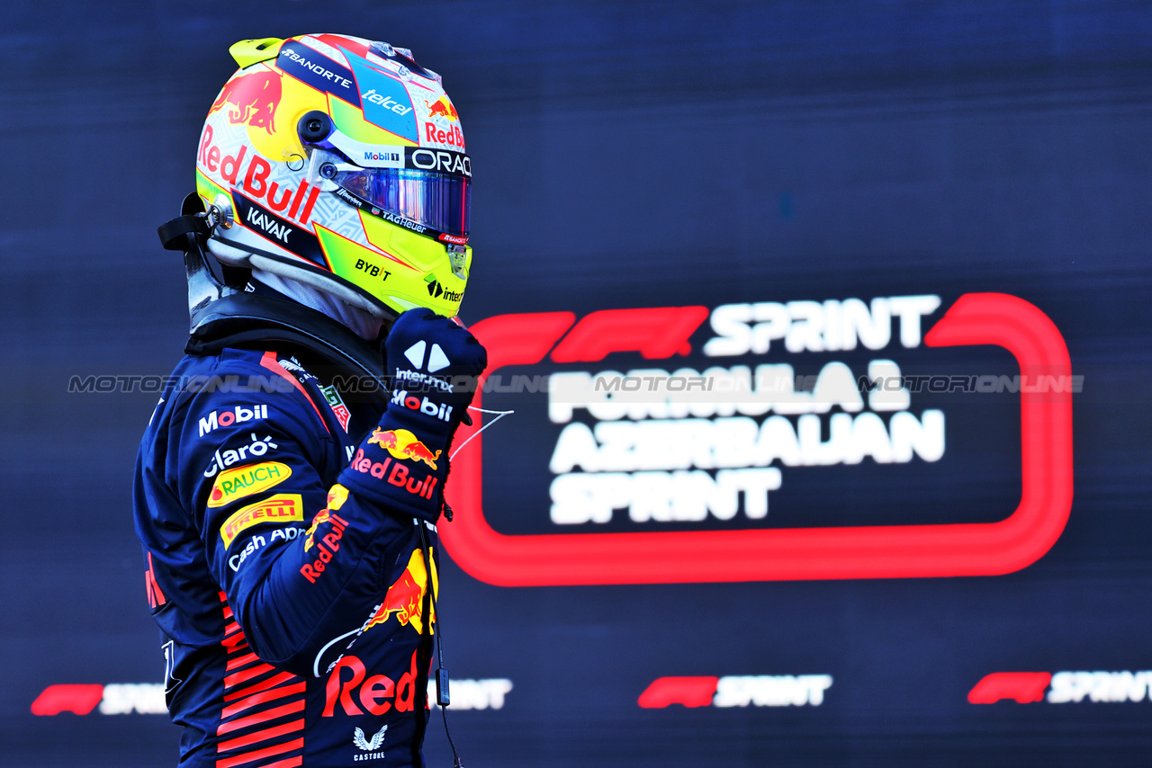 GP AZERBAIJAN, Sprint winner Sergio Perez (MEX) Red Bull Racing celebrates in parc ferme.

29.04.2023. Formula 1 World Championship, Rd 4, Azerbaijan Grand Prix, Baku Street Circuit, Azerbaijan, Sprint Day.

- www.xpbimages.com, EMail: requests@xpbimages.com ¬© Copyright: Batchelor / XPB Images