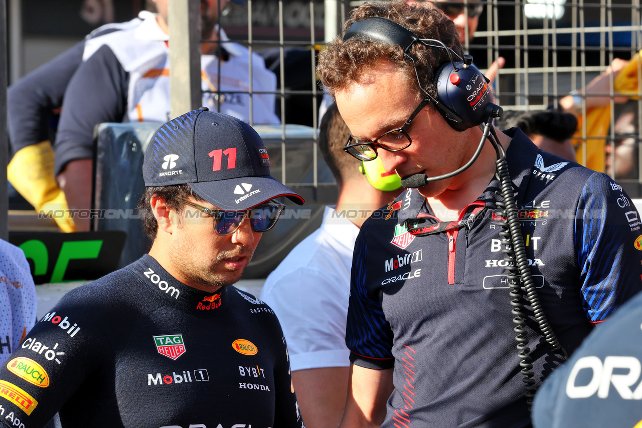 GP AZERBAIJAN, (L to R): Sergio Perez (MEX) Red Bull Racing with Hugh Bird (GBR) Red Bull Racing Engineer on the grid.

29.04.2023. Formula 1 World Championship, Rd 4, Azerbaijan Grand Prix, Baku Street Circuit, Azerbaijan, Sprint Day.

- www.xpbimages.com, EMail: requests@xpbimages.com ¬© Copyright: Batchelor / XPB Images